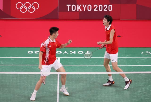 开云-国羽男双遗憾摘银 李俊慧未能实现奥运“脱衣庆祝”